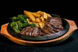 Steak with Pimientos and Fries